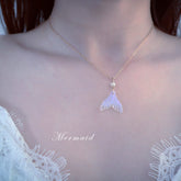 Woman Wearing Mermaid Tail Pearl Necklace - Glöd of Sweden