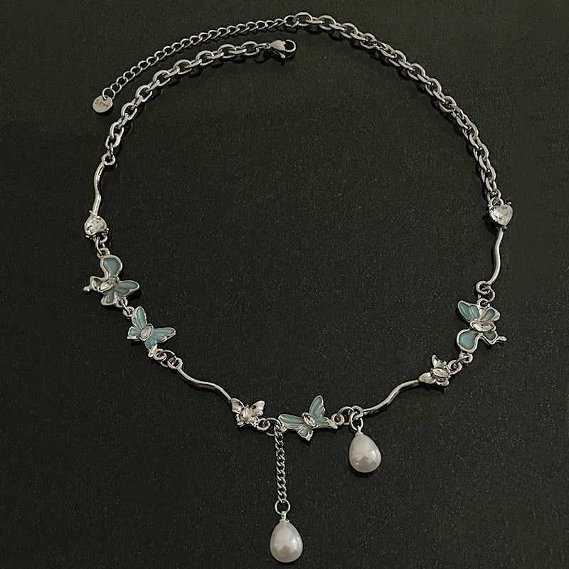 Butterfly Stitching Pearl Tassel Necklace - Glöd of Sweden
