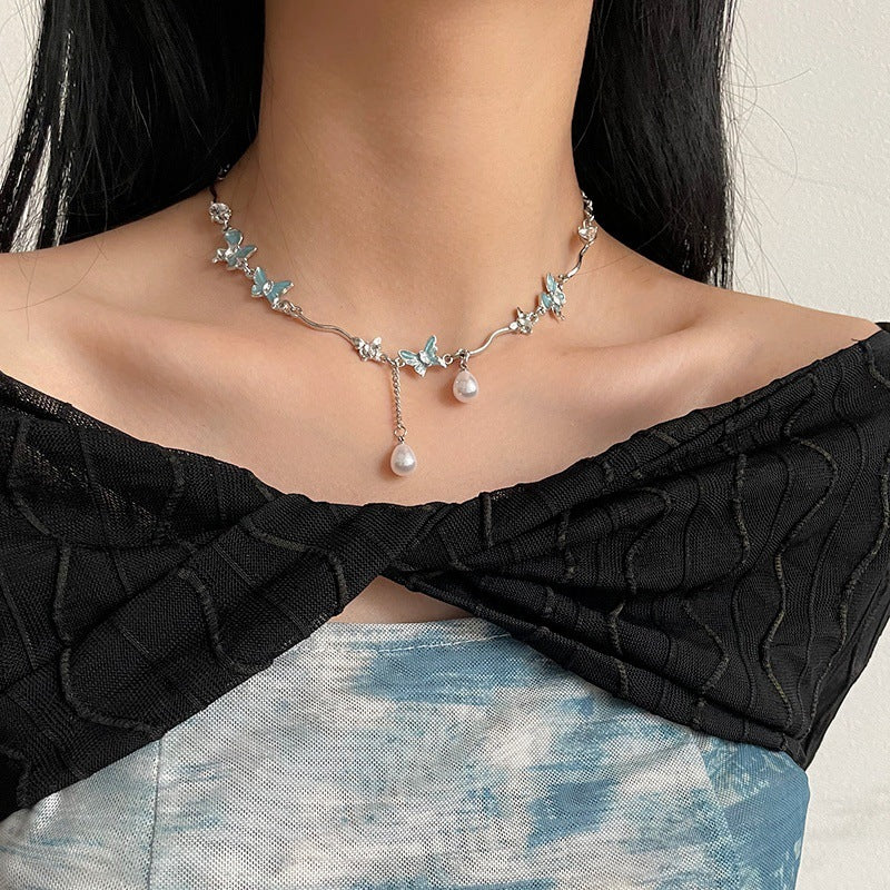 Butterfly Stitching Pearl Tassel Necklace - Glöd of Sweden