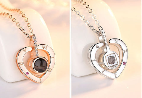 Two Sterling Silver heart-shaped necklaces, one with a rose gold finish and the other with a silver finish