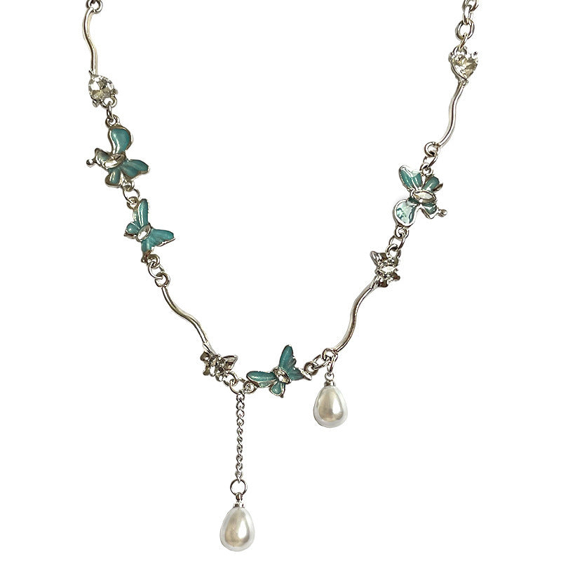 Butterfly Stitching Pearl Tassel Necklace - Glöd of Sweden