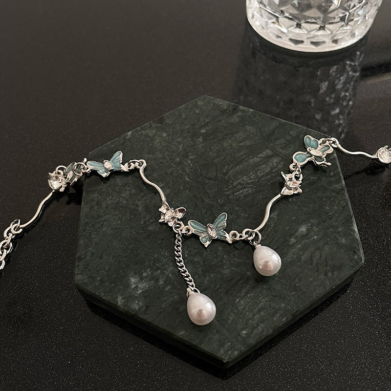 Butterfly Stitching Pearl Tassel Necklace - Glöd of Sweden