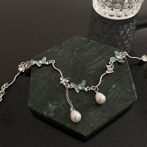 Butterfly Stitching Pearl Tassel Necklace - Glöd of Sweden