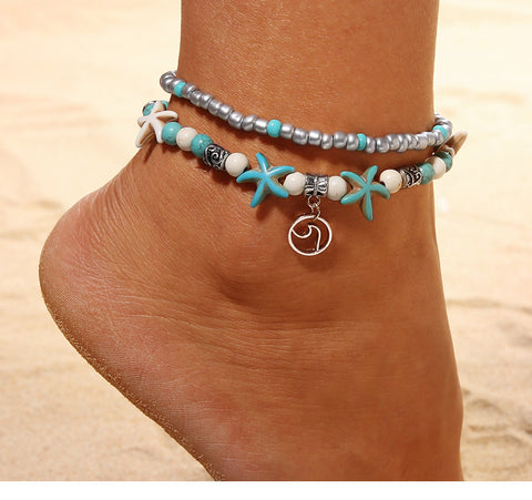 Woman Showing Her Beach Anklet - Glöd of Sweden