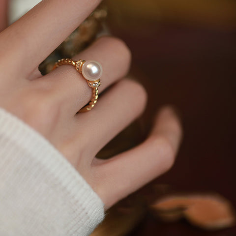 Woman Wearing Antique Gold Pearl Ring - Glöd of Sweden