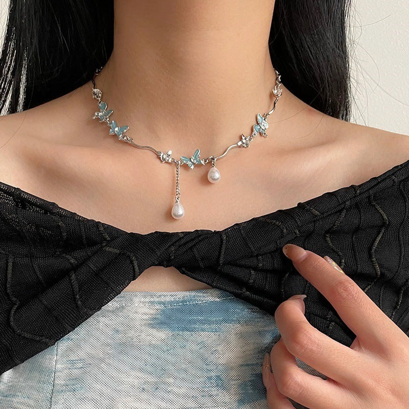 Butterfly Stitching Pearl Tassel Necklace - Glöd of Sweden